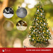 9-foot pre-decorated green PVC Christmas tree for holiday decorating