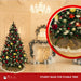 9-foot pre-decorated green PVC Christmas tree for holiday decorating