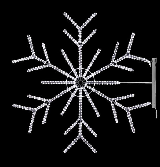 4-foot Arctic Double Chevron Snowflake rope light with twinkling cool white LEDs mounted on a pole outdoors