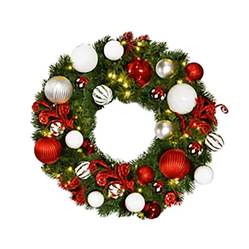 Red, white, and silver pre-decorated Christmas wreath illuminated with warm white lights