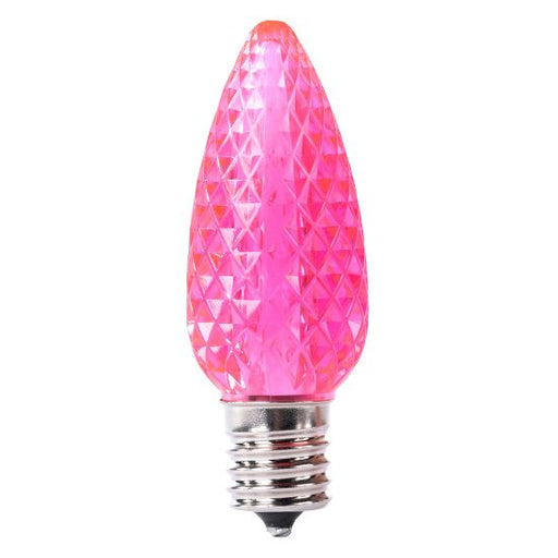 Bright pink C9 SMD LED Christmas bulb with faceted lens and E17 base, featuring saturated color, 360 degree illumination, and durable sealed construction for indoor and outdoor professional displays.